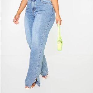 Pretty Little Thing mid wash split hem jeans